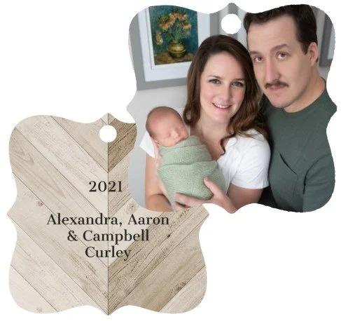 Family holding baby