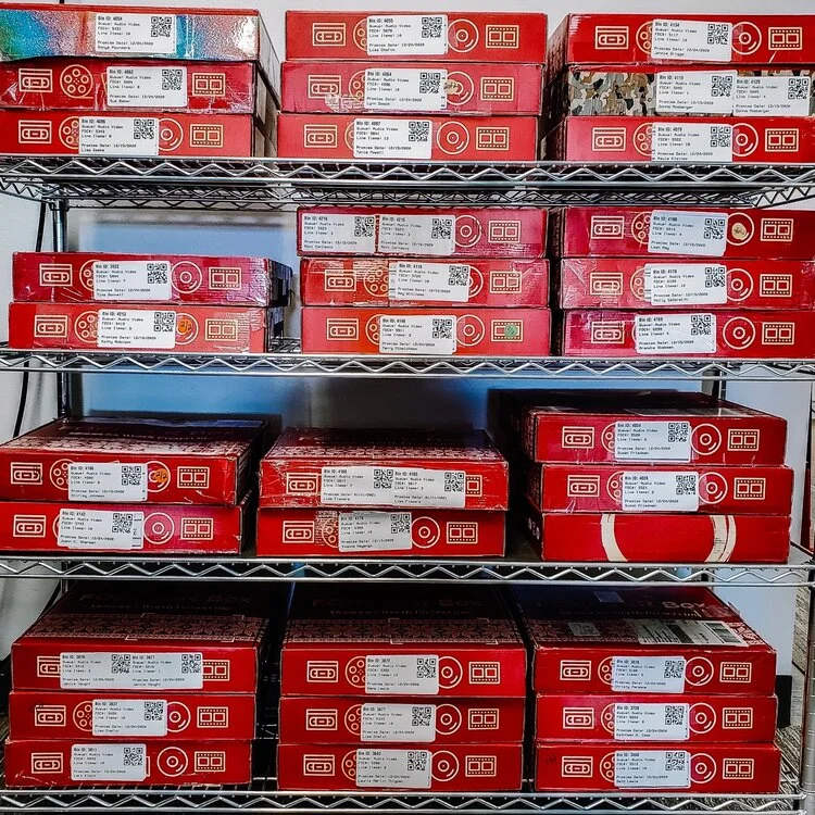 red boxes on a shelf