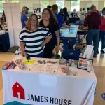 people smiling at james house event